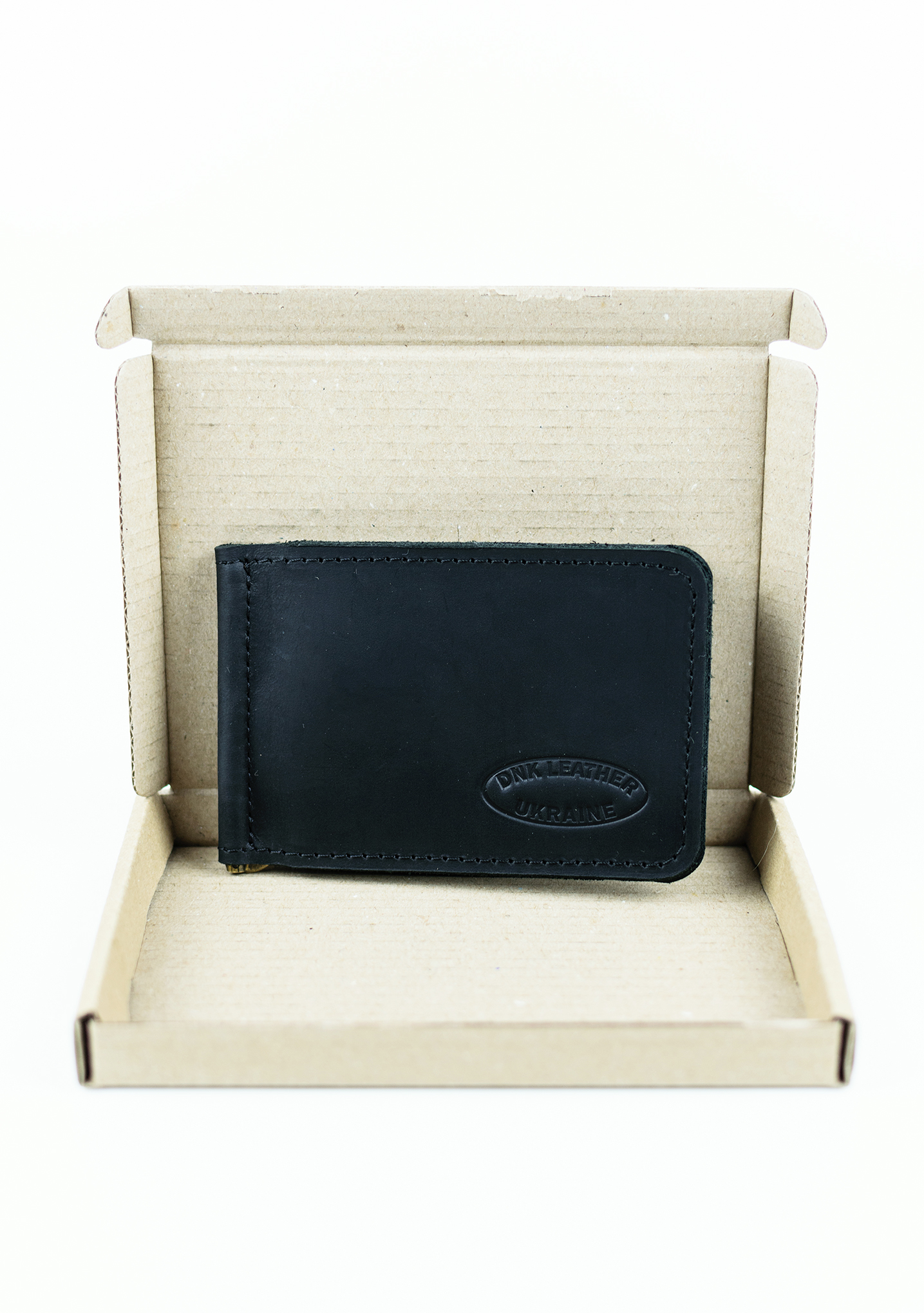 Затиск шкіряний для купюр DNK Leather DNK-LW-09-col.J чорний Затиск шкіряний для купюр DNK Leather DNK-LW-09-col.J чорний